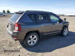 2014 Jeep Compass Sport with VIN 1C4NJDBB3ED757029, listed as a Copart auction lot 52460225 with 127,814 mi miles and Salvage Title. Bid and sale history available at carsss.com. Image 3.