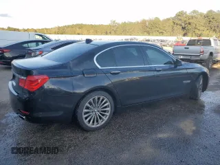 2011 BMW 7 Series 740i with VIN WBAKA4C55BC612987, listed as a Copart auction lot 76607654 with 154,118 mi miles and Salvage Title. Bid and sale history available at carsss.com. Image 3.