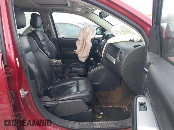 2016 Jeep Compass Latitude with VIN 1C4NJDEBXGD674518, listed as a IAAI auction lot 41956884 with 158,125 mi miles. Bid and sale history available at carsss.com. Image 5.