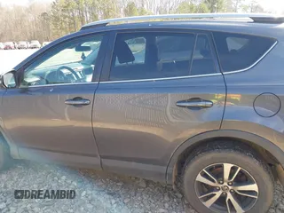 2018 Toyota RAV4 XLE with VIN 2T3WFREV2JW450019, listed as a IAAI auction lot 41704084 with 257,737 mi miles. Bid and sale history available at carsss.com. Image 14.