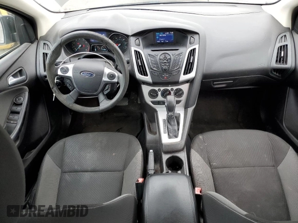 2013 Ford Focus SE z VIN 1FADP3F20DL335132, wystawiony jako Copart lot #61042315 z przebiegiem 149 443 mil mil oraz Czysty tytuł • Clean title. Historia ofert i sprzedaży dostępna na DreamBid. Obrazek 8.