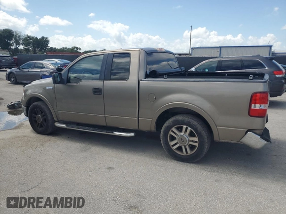 2005 Ford F-150 XLT with VIN 1FTRX12585FA42177, listed as a Copart auction lot 64841645 with 153,779 mi miles and Salvage title. Bid and sale history available at DreamBid. Image 2.