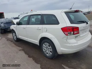 2014 Dodge Journey SE with VIN 3C4PDCAB7ET134454, listed as a IAAI auction lot 41625094 with 145,814 mi miles. Bid and sale history available at carsss.com. Image 3.