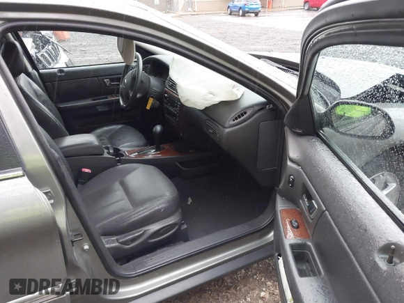 2003 Mercury Sable LS Premium with VIN 1MEFM55S13G612515, listed as a IAAI auction lot 41837589 with 62,173 mi miles and . Bid and sale history available at DreamBid. Image 5.