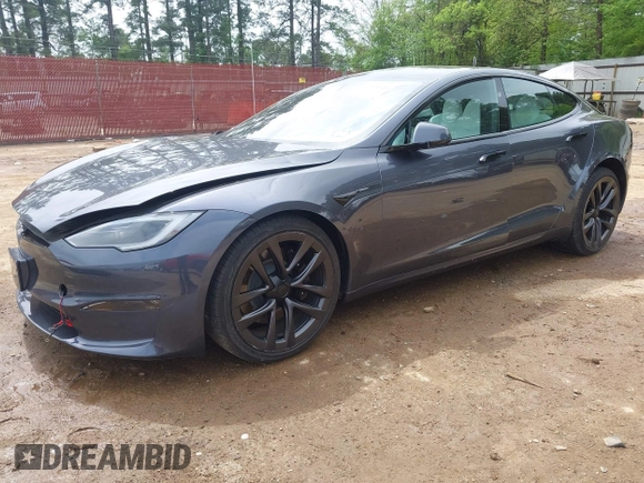 2023 Tesla Model S with VIN 5YJSA1E53PF511231, listed as a IAAI auction lot 41924626 with Not provided miles and . Bid and sale history available at DreamBid. Image 2.