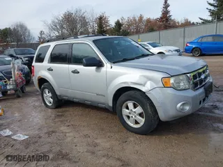 2008 Ford Escape XLT with VIN 1FMCU93Z88KA45196, listed as a IAAI auction lot 41645589 with 212,019 mi miles. Bid and sale history available at carsss.com. Image 1.