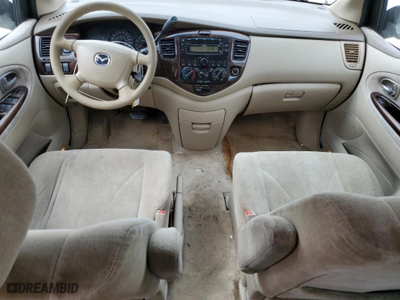 2000 Mazda MPV DX with VIN JM3LW28G0Y0116245, listed as a Copart auction lot 71654914 with 330,693 mi miles and Salvage Title. Bid and sale history available at carsss.com. Image 8.