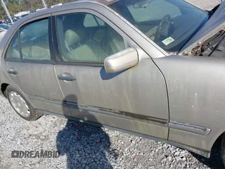 1997 Mercedes-Benz E-Class with VIN WDBJF55F4VA405680, listed as a IAAI auction lot 41462478 with 352,480 mi miles. Bid and sale history available at carsss.com. Image 12.