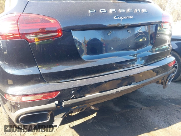 2016 Porsche Cayenne with VIN WP1AA2A28GKA37162, listed as a IAAI auction lot 41424921 with 95,717 mi miles. Bid and sale history available at carsss.com. Image 6.