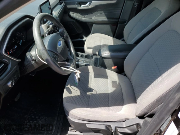 2021 Ford Escape SE with VIN 1FMCU9G66MUA94797, listed as a Copart auction lot 60864235 with 64,712 mi miles and Salvage title. Bid and sale history available at DreamBid. Image 7.
