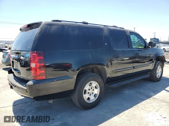 2007 Chevrolet Suburban LTZ with VIN 3GNFC16J27G211284, listed as a Copart auction lot 56581835 with 186,515 mi miles and Salvage title. Bid and sale history available at DreamBid. Image 3.