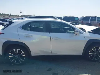 2021 Lexus UX with VIN JTHX9JBH9M2040678, listed as a IAAI auction lot 41727164 with 71,004 mi miles. Bid and sale history available at carsss.com. Image 13.