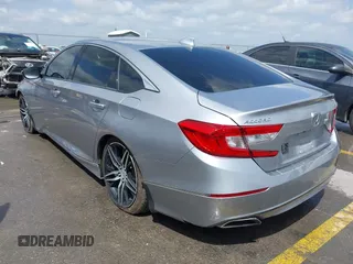 2020 Honda Accord Touring with VIN 1HGCV2F96LA018714, listed as a IAAI auction lot 42084295 with 74,861 mi miles and . Bid and sale history available at DreamBid. Image 3.