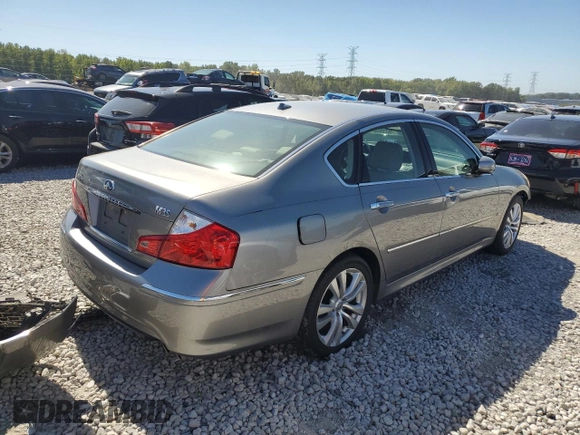 2010 Infiniti M with VIN JN1CY0AP5AM911259, listed as a Copart auction lot 74220044 with 265,925 mi miles and Salvage Title. Bid and sale history available at DreamBid. Image 3.