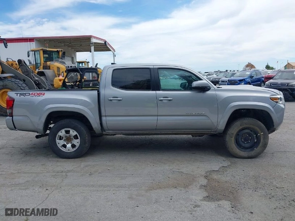 2019 Toyota Tacoma 4WD SR with VIN 3TMCZ5AN4KM194526, listed as a IAAI auction lot 42021504 with 87,767 mi miles. Bid and sale history available at carsss.com. Image 13.