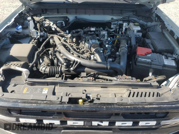 2023 Ford Bronco with VIN 1FMEE5BP0PLC06549, listed as a Copart auction lot 58703305 with 28,051 mi miles and Salvage title. Bid and sale history available at DreamBid. Image 12.