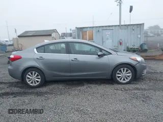2014 Kia Forte EX with VIN KNAFX4A8XE5213014, listed as a IAAI auction lot 41000589 with 89,890 mi miles. Bid and sale history available at carsss.com. Image 13.