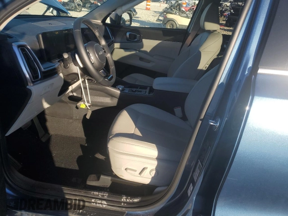 2025 Kia Sorento Hybrid EX with VIN KNDRHDJG9S5289243, listed as a Copart auction lot 84299744 with 7,406 mi miles and Salvage Title. Bid and sale history available at carsss.com. Image 7.