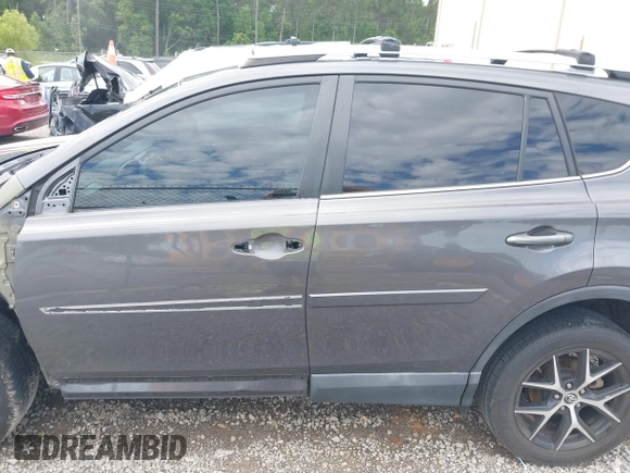 2016 Toyota RAV4 SE with VIN 2T3NFREV2GW309858, listed as a IAAI auction lot 42236828 with 129,602 mi miles and . Bid and sale history available at DreamBid. Image 15.