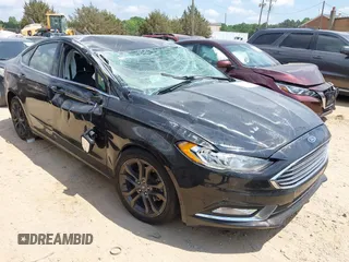 2018 Ford Fusion SE z VIN 3FA6P0HD6JR183666, wystawiony jako IAAI lot #42155151 z przebiegiem 112 941 mil mil oraz . Historia ofert i sprzedaży dostępna na DreamBid. Obrazek 1.