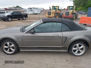 2001 Ford Mustang Deluxe z VIN 1FAFP44411F159656, wystawiony jako IAAI lot #42123128 z przebiegiem 191 814 mil mil oraz . Historia ofert i sprzedaży dostępna na DreamBid. Obrazek 15.
