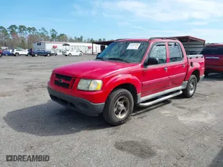 2005 Ford Explorer Sport Trac XLS with VIN 1FMZU67K65UA71317, listed as a IAAI auction lot 41523150 with 207,896 mi miles. Bid and sale history available at carsss.com. Image 2.