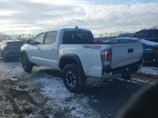 2023 Toyota Tacoma 4WD SR with VIN 3TMCZ5ANXPM599135, listed as a IAAI auction lot 41442577 with 26,901 mi miles. Bid and sale history available at carsss.com. Image 3.