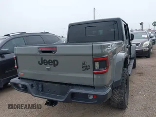 2022 Jeep Gladiator Texas Trail z VIN 1C6HJTAG2NL176011, wystawiony jako IAAI lot #42193864 z przebiegiem 27 219 mil mil oraz . Historia ofert i sprzedaży dostępna na DreamBid. Obrazek 4.