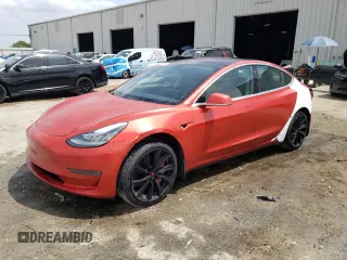 2018 Tesla Model 3 Long Range Battery with VIN 5YJ3E1EAXJF031944, listed as a Copart auction lot 53619445 with 146,031 mi miles and Salvage Title. Bid and sale history available at DreamBid. Image 1.