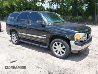 2003 GMC Yukon SLT with VIN 1GKEK13Z43J119950, listed as a IAAI auction lot 42564593 with 208,728 mi miles and . Bid and sale history available at DreamBid. Image 1.