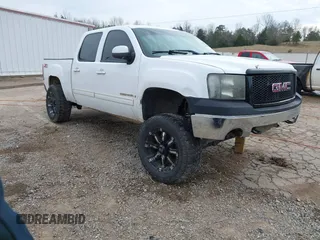 2007 GMC Sierra 1500 SLT z VIN 2GTEK13M671650485, wystawiony jako IAAI lot #41208784 z przebiegiem Nie podano mil oraz . Historia ofert i sprzedaży dostępna na DreamBid. Obrazek 1.