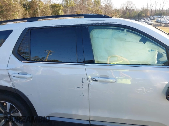 2024 Honda Pilot Touring with VIN 5FNYG2H7XRB016877, listed as a IAAI auction lot 41496013 with 18,213 mi miles and . Bid and sale history available at DreamBid. Image 13.