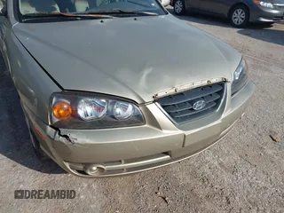 2005 Hyundai Elantra GLS with VIN KMHDN46DX5U109033, listed as a IAAI auction lot 42586032 with 119,550 mi miles and . Bid and sale history available at DreamBid. Image 6.