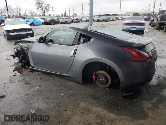 2016 Nissan 370Z Sport с VIN JN1AZ4EH3GM936250, выставлен на аукционе Copart как лот 44227205 с пробегом Не указан миль и Списание • Salvage title. История ставок и продаж доступна на DreamBid. Изображение 2.