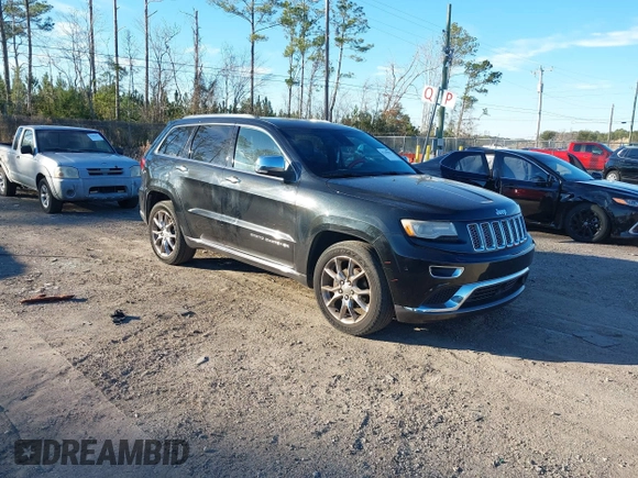 2014 Jeep Grand Cherokee Summit with VIN 1C4RJEJG1EC130727, listed as a IAAI auction lot 41269066 with 205,914 mi miles and . Bid and sale history available at DreamBid. Image 1.