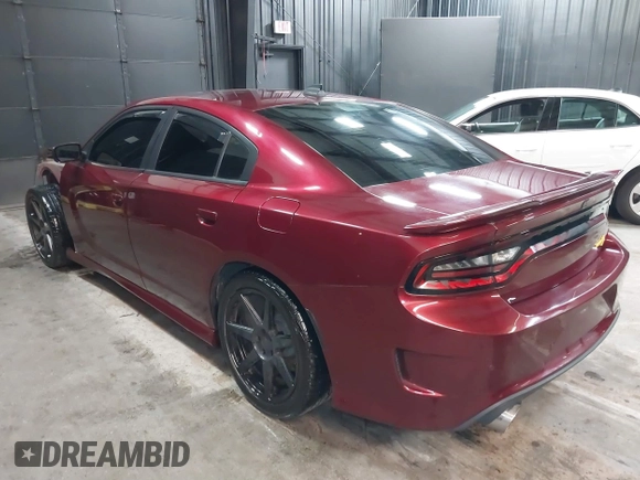 2019 Dodge Charger SRT Hellcat with VIN 2C3CDXL92KH693077, listed as a IAAI auction lot 39361432 with 57,522 mi miles and . Bid and sale history available at DreamBid. Image 3.
