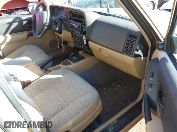 1999 Jeep Cherokee Sport with VIN 1J4FT68S7XL589206, listed as a IAAI auction lot 41411949 with 143,158 mi miles and . Bid and sale history available at DreamBid. Image 5.