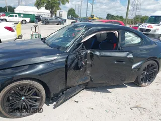 2024 BMW M2 z VIN 3MF13DM0XR8D99996, wystawiony jako IAAI lot #42042486 z przebiegiem 8120 mil mil oraz . Historia ofert i sprzedaży dostępna na DreamBid. Obrazek 6.