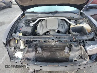2011 Dodge Charger RT Plus with VIN 2B3CM5CT6BH517548, listed as a Copart auction lot 82219834 with 114,134 mi miles and Salvage Title. Bid and sale history available at carsss.com. Image 11.