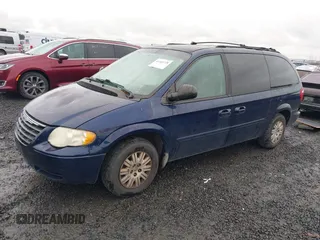 2006 Chrysler Town & Country LWB LX with VIN 2A4GP44R46R800898, listed as a IAAI auction lot 41465720 with 215,423 mi miles. Bid and sale history available at carsss.com. Image 2.