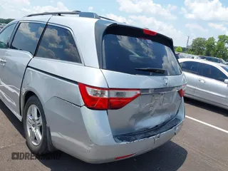 2011 Honda Odyssey Touring with VIN 5FNRL5H99BB058448, listed as a IAAI auction lot 42651432 with 208,581 mi miles and . Bid and sale history available at DreamBid. Image 6.