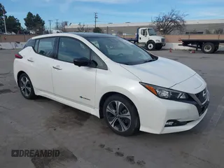 2019 Nissan LEAF SV z VIN 1N4AZ1CP0KC306485, wystawiony jako IAAI lot #41701586 z przebiegiem 60 157 mil mil oraz . Historia ofert i sprzedaży dostępna na DreamBid. Obrazek 1.
