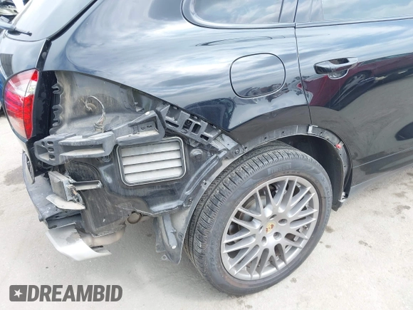2014 Porsche Cayenne with VIN WP1AA2A29ELA97300, listed as a IAAI auction lot 42106931 with 156,129 mi miles and . Bid and sale history available at DreamBid. Image 18.