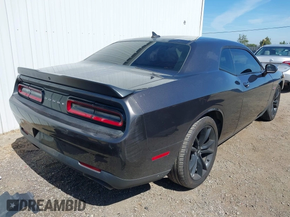 2017 Dodge Challenger R/T Plus with VIN 2C3CDZBT8HH600032, listed as a IAAI auction lot 42173591 with 92,303 mi miles and . Bid and sale history available at DreamBid. Image 4.