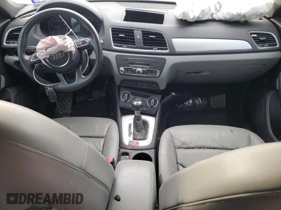 2017 Audi Q3 Premium z VIN WA1BCCFS0HR016968, wystawiony jako Copart lot #79358604 z przebiegiem Nie podano mil oraz Szkody całkowita. Historia ofert i sprzedaży dostępna na DreamBid. Obrazek 8.