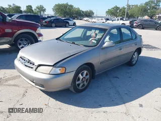 1999 Nissan Altima XE with VIN 1N4DL01D1XC255927, listed as a IAAI auction lot 42003101 with 154,000 mi miles. Bid and sale history available at carsss.com. Image 2.