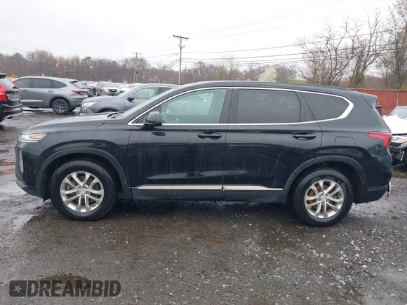 2019 Hyundai Santa Fe SE with VIN 5NMS23AD8KH008680, listed as a IAAI auction lot 42023218 with 67,745 mi miles and . Bid and sale history available at DreamBid. Image 14.
