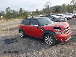 2015 MINI Countryman S z VIN WMWZC3C50FWT05122, wystawiony jako IAAI lot #41572503 z przebiegiem 120 885 mil mil oraz . Historia ofert i sprzedaży dostępna na DreamBid. Obrazek 1.