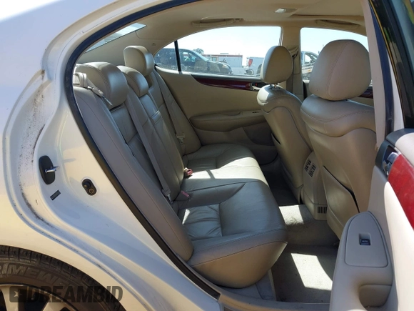2004 Lexus ES 330 with VIN JTHBA30G645028767, listed as a IAAI auction lot 42150538 with 163,449 mi miles. Bid and sale history available at carsss.com. Image 8.