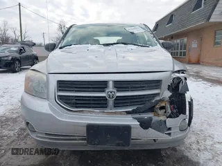 2007 Dodge Caliber SXT with VIN 1B3HB48B07D159549, listed as a IAAI auction lot 41330969 with 124,911 mi miles and . Bid and sale history available at DreamBid. Image 12.
